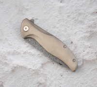Складной нож из стали S390 в нержавеющих обкладках
